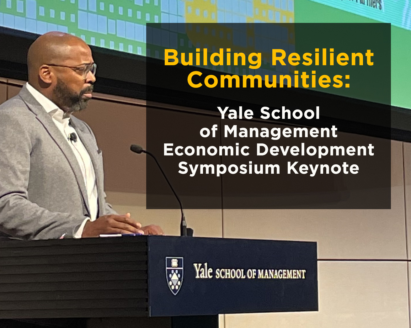 Momentus Capital CEO Ellis Carr Speaks at Podium at Yale School of Management Symposium