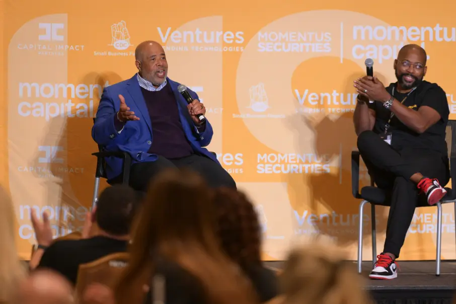Ellis Carr and Gary Cunningham discuss the need to disrupt the financial sector to support equity and inclusion at the Momentus Capital All Hands.