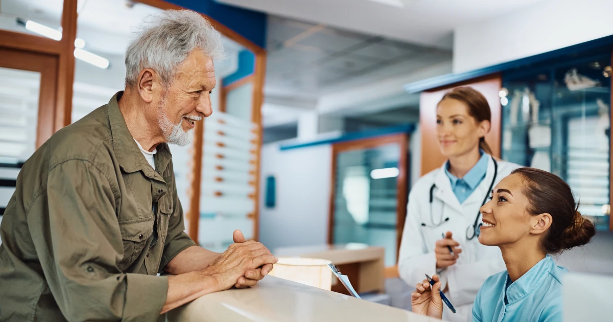 Patient checking in at a community health center supported through community health center financing.