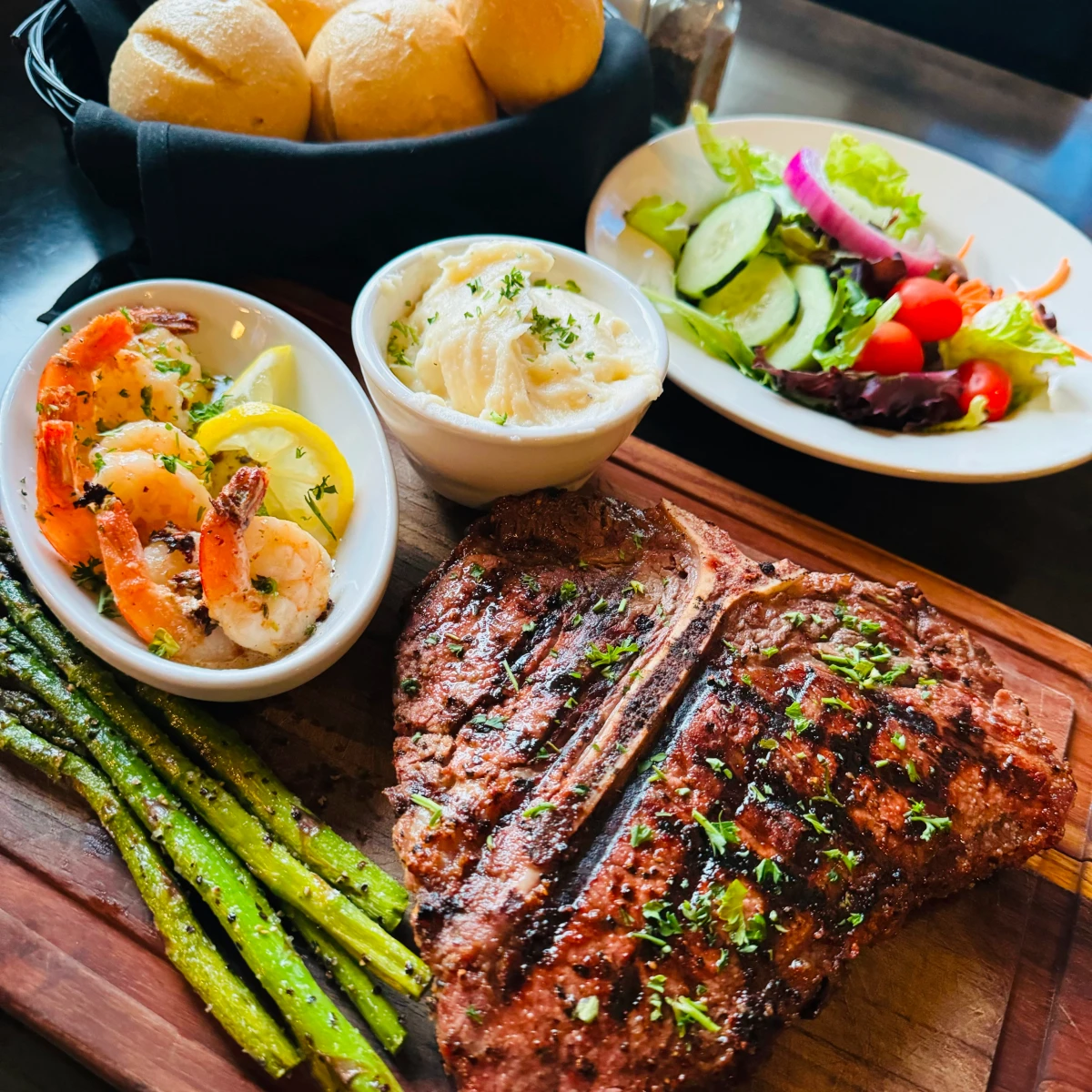 Chef prepared USDA Prime, aged, 24oz Porterhouse steak at CheyAnne’s Steakhouse and Lounge, highlighted as a holiday gift idea in the Momentus Capital small business holiday gift guide.